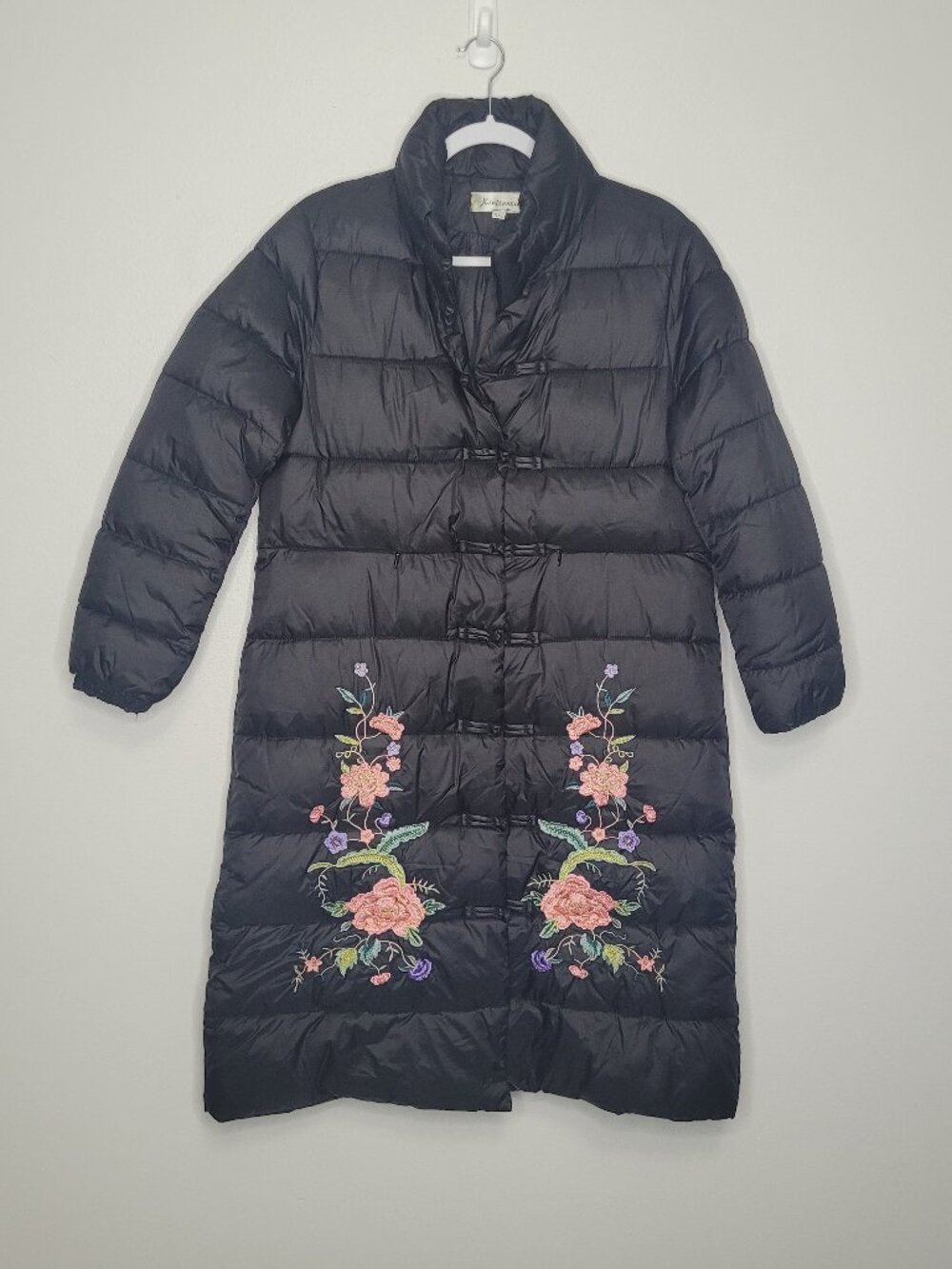 Black long puffer floral embroidered partial zip front jacket